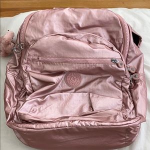 metallic pink kipling backpack